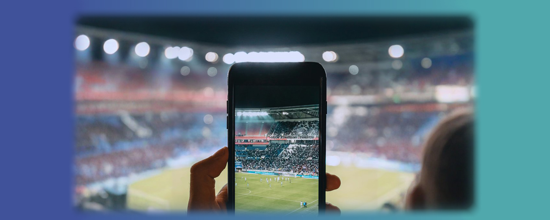 Header graphic with smartphone being used to take a photo in the stadium. Symbol image for user-generated content (UGC)